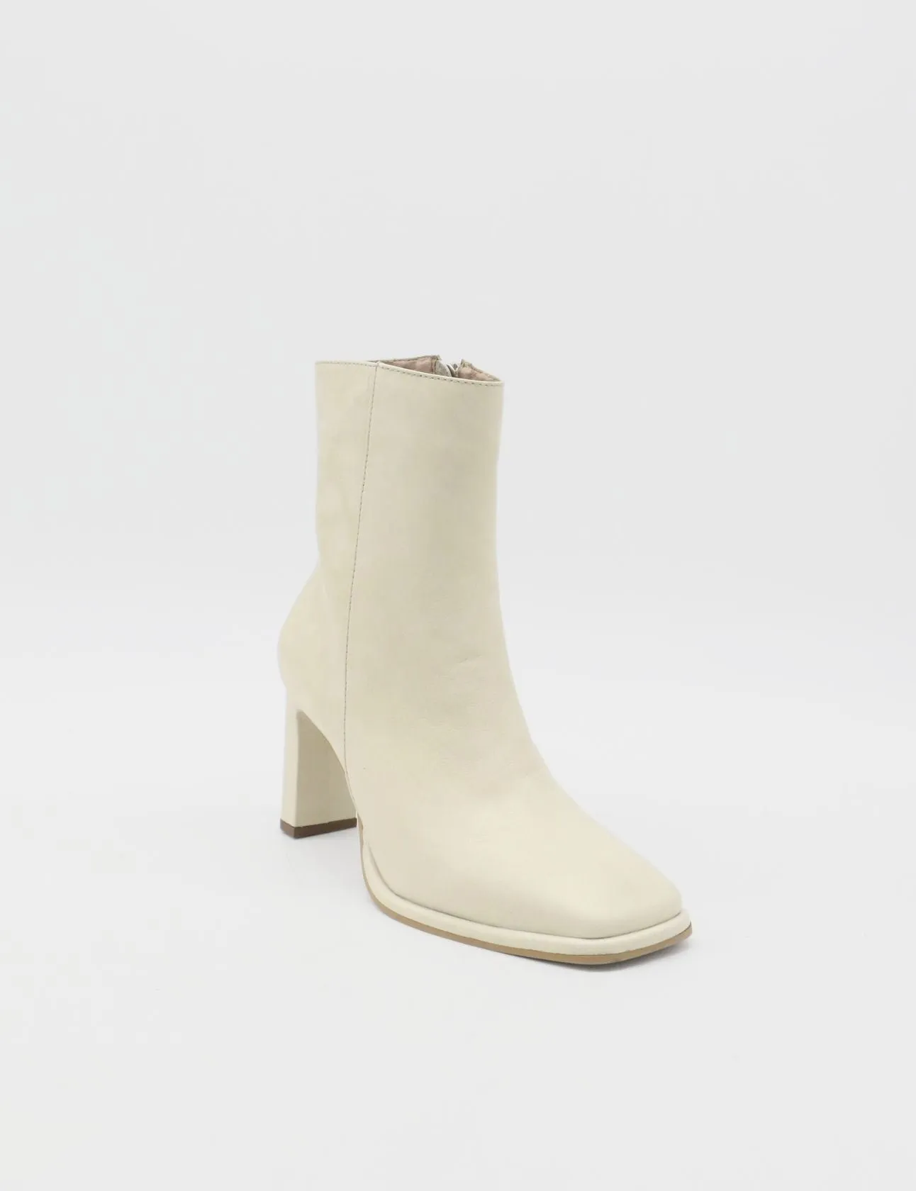 Indigo heeled ankle boots in off white leather womens shoes