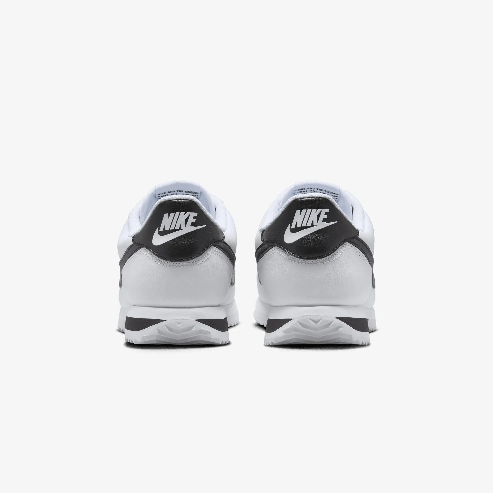 NIKE | WMN'S CORTEZ LEATHER { WHITE/BLACK