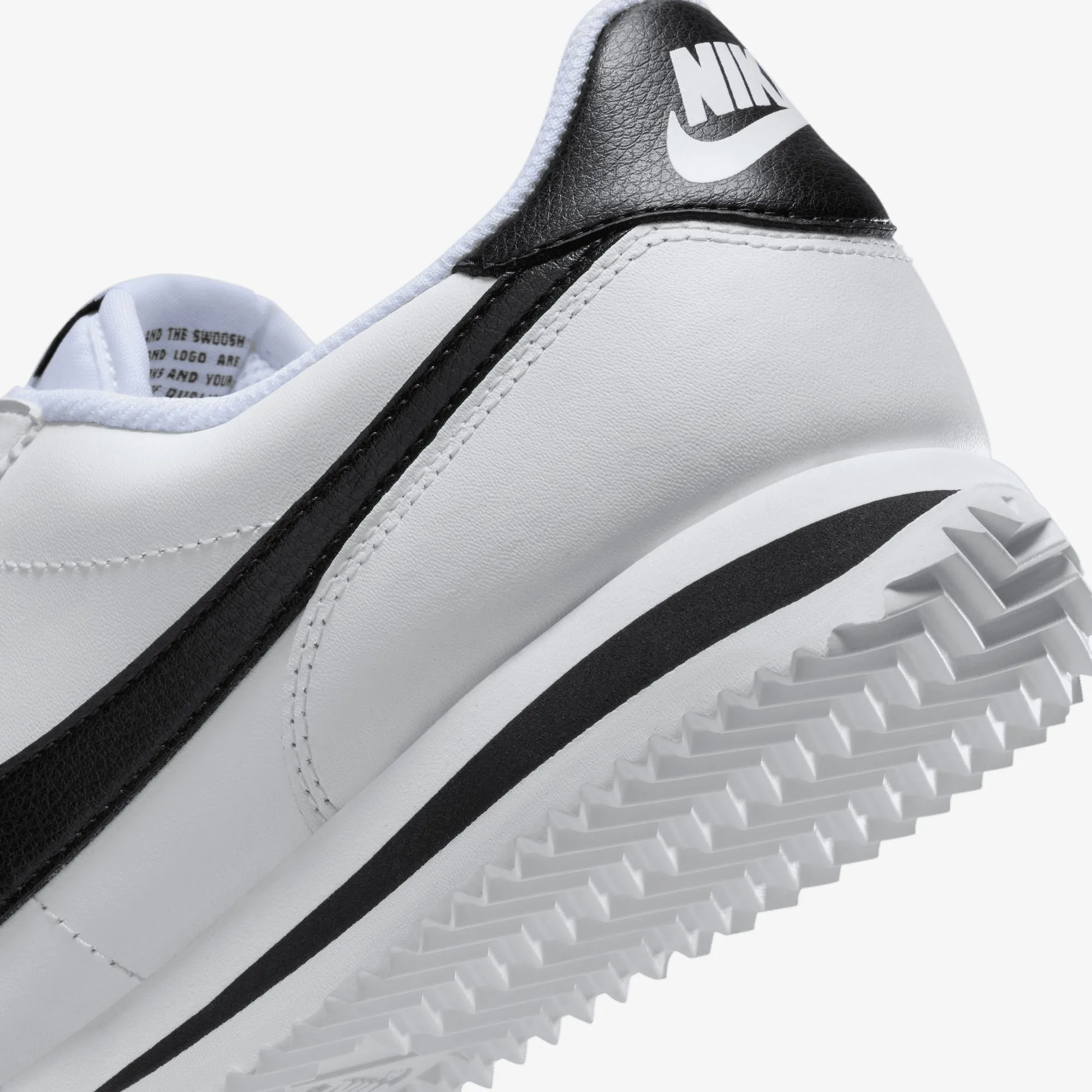 NIKE | WMN'S CORTEZ LEATHER { WHITE/BLACK